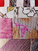 Detail of patchwork textile with various patterns