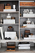 Stacked magazines and vintage accessories on sjelves