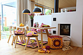 Crocheted textiles in dining room in modern country-house style