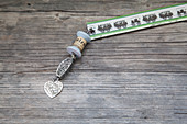 Vintage-style bookmark with pendant made from old yarn reel