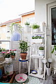 Balcony decorated in romantic shabby-chic style