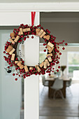 Wreath of red berries and corks