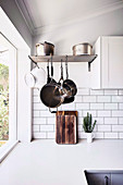 Metal shelf for pots and pans for hanging and standing