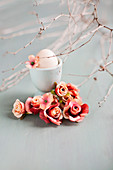 Roses, twigs and egg in eggcup