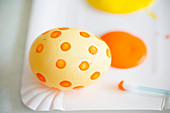 Painting Easter eggs using gouache paint
