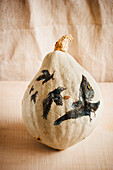 Pumpkin painted with ravens
