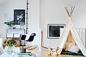 Child's teepee and rocking chair in classic living room