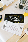 Invitation card for space-themed birthday party