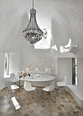 Dining room with vaulted ceiling in Mediterranean stone house