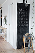 Advent calendar of numbers to strike through on chalkboard