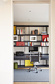 Shelving with integrated desk in study
