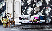 Opulent floral wallpaper in the living room with dark colors