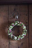 Wreath of lichen, moss, edelweiss, pink pussytoes and pinks
