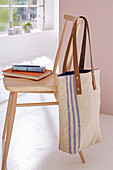 A DIY shopping bag made from linen with leather straps