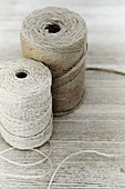 Two reels of jute twine in different natural shades
