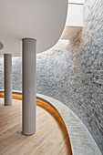 Detail of curved basement wall with lightwell