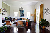 Living room in natural tones with dark wooden floor