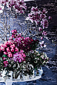 Flower decoration with magnolias and roses
