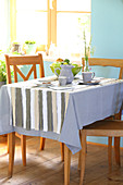 DIY tablecloth with strips of fabric