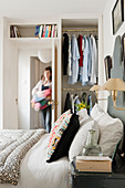 Open-fronted wardrobe in bedroom