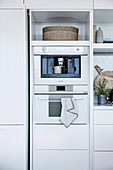 Cabinet module with kitchen appliances and storage compartment in the kitchen
