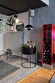 Red wine rack, home bar and fan in masculine living room