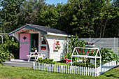 Play house in American fifties style in garden