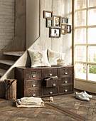 Industrial-style chest of drawers against side of steps
