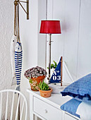 Room decorated with maritime accessories