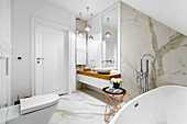 Elegant bathroom with marble tiles