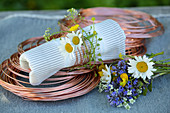 Napkin ring handmade from copper wire and wildflowers