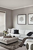 White couch and ottoman in living room