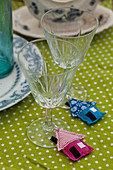 Handsewn, house-shaped drinking glass labels