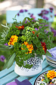 Bouquet of parsley, sage, mint, rosemary and French marigolds