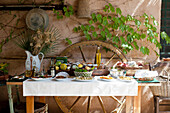 Antipasti and fruit bowl on Mediterranean table