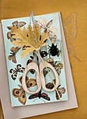 Craft materials and card with butterfly motif