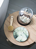 Wooden stool with bath utensils and decoration