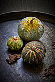 Pumpkins on a wooden tray