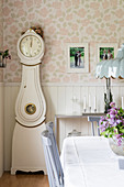 Typical Swedish long-case clock in Scandi-style dining room