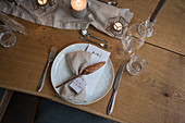 Wedding place setting in natural shades with greeting