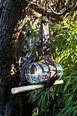 DIY bird feeder made from jam jar