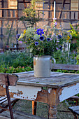 Late summer garden bouquet on a table in the garden