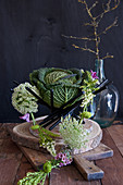 Savoy cabbage with garland of flowers
