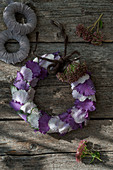 Wreath of white and purple ornamental cabbage leaves and sedums