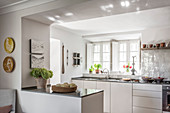 Sunny, white modern kitchen