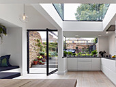 Multi-storey architect-designed house with swivelling terrace doors