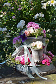Roses and ribbon on handmade plant stand
