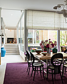 Spacious split-level dining area with large sliding windows