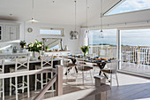Open plan kitchen and dining room with sea views