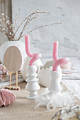 Curved candles on an Easter table